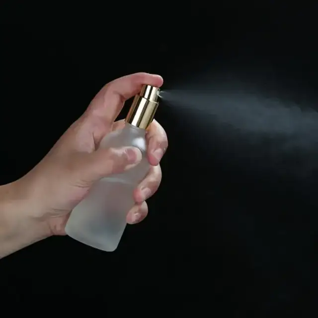Empty perfume spray bottles view 2