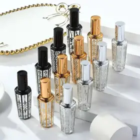 Empty perfume spray bottles view 1